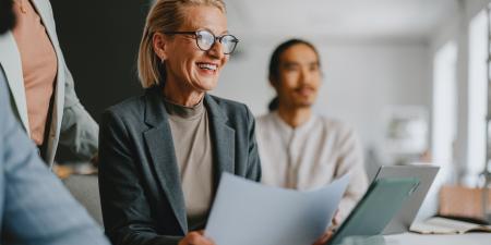 business woman wearing glasses with laptop