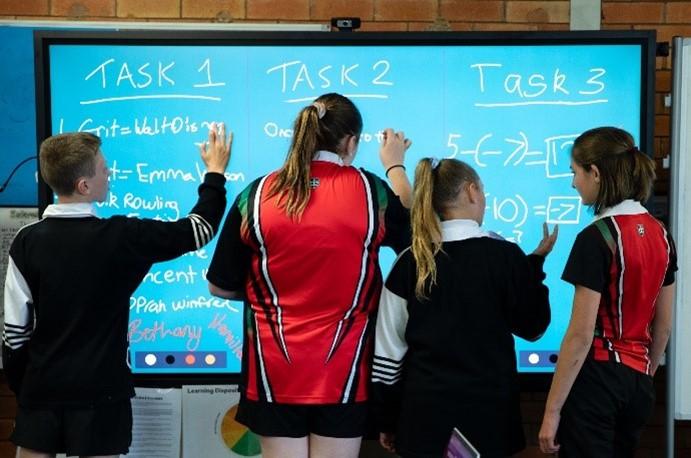 Students using an interactive display at Dubbo College South